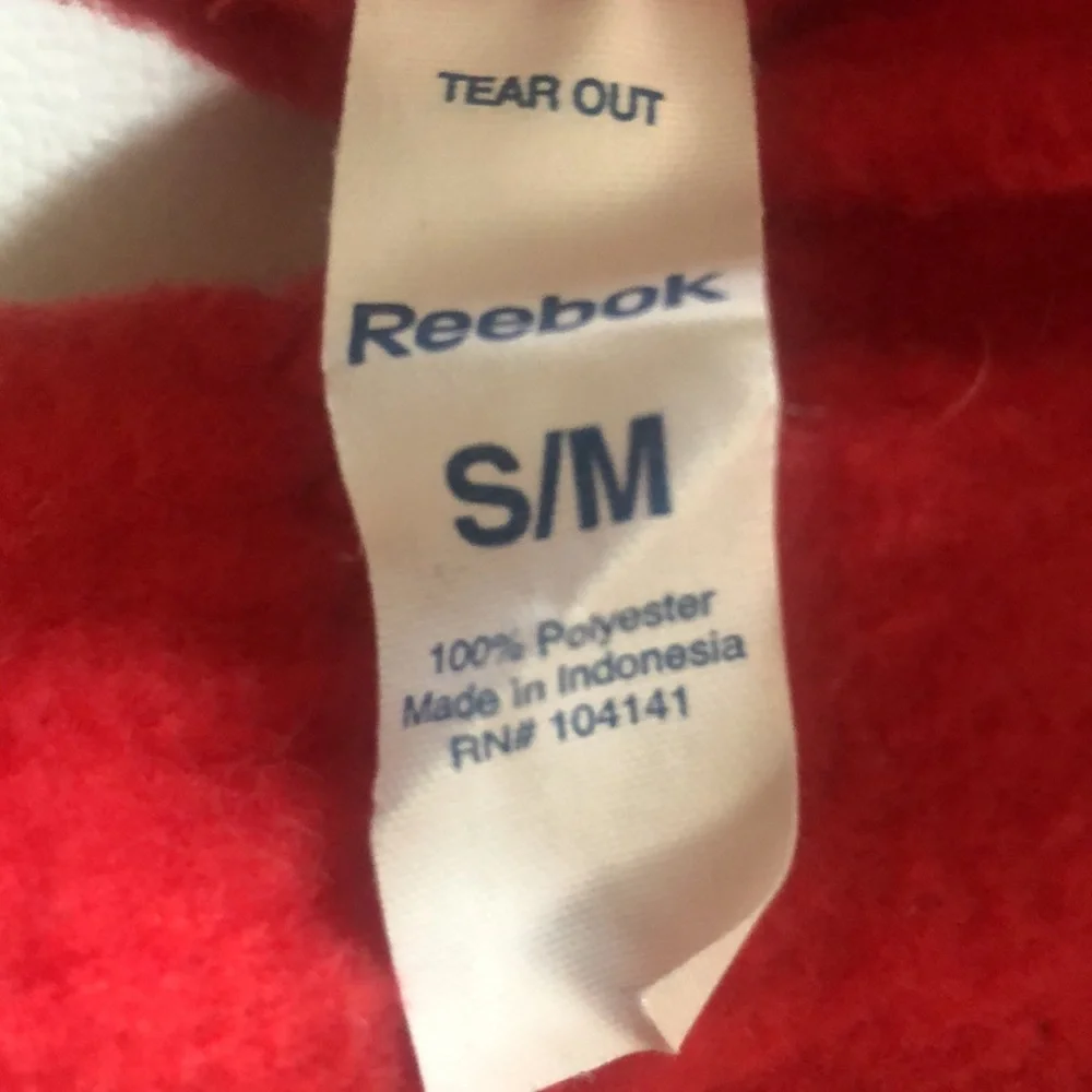 Red fleece gloves by Reebok warm good condition